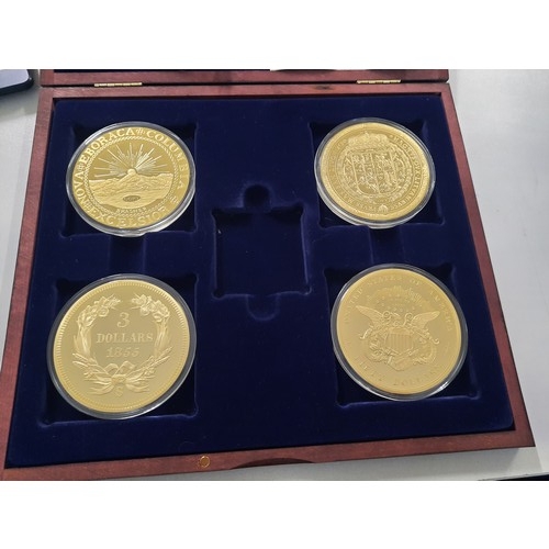 237 - Set of 4 gold giants gold plated coins all with C.O.As in wooden display case