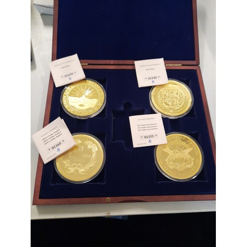 237 - Set of 4 gold giants gold plated coins all with C.O.As in wooden display case