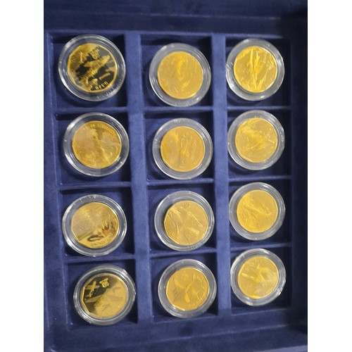 238 - The legendary aircraft brass coin collection with 24 coins in blue case