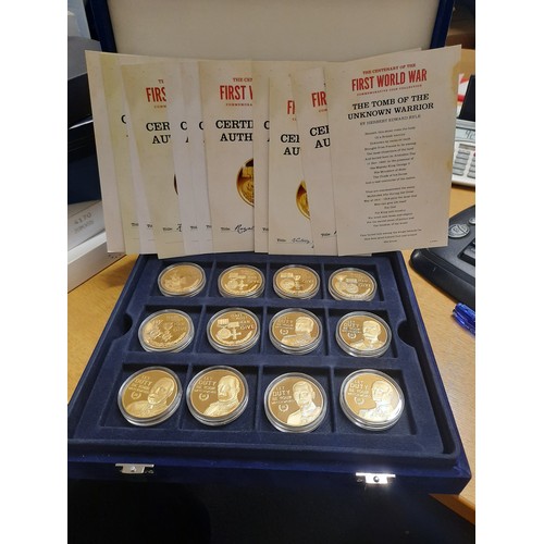 292 - The centenary of the first world are commemorative coin collection with 12 coins all with C.O.As