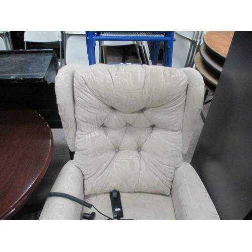 667 - Upholstered wing back electrical recliner armchair