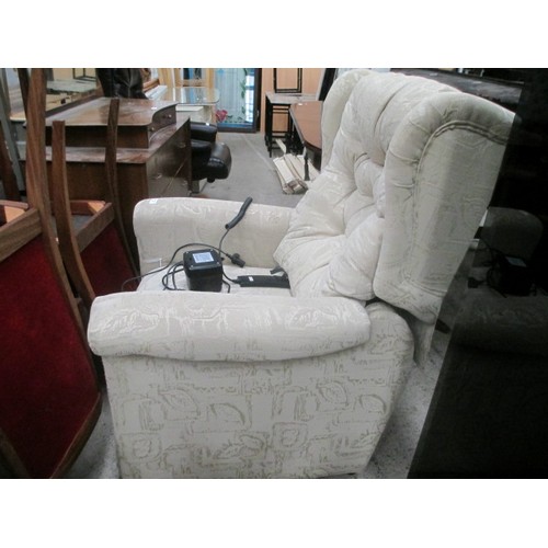 667 - Upholstered wing back electrical recliner armchair