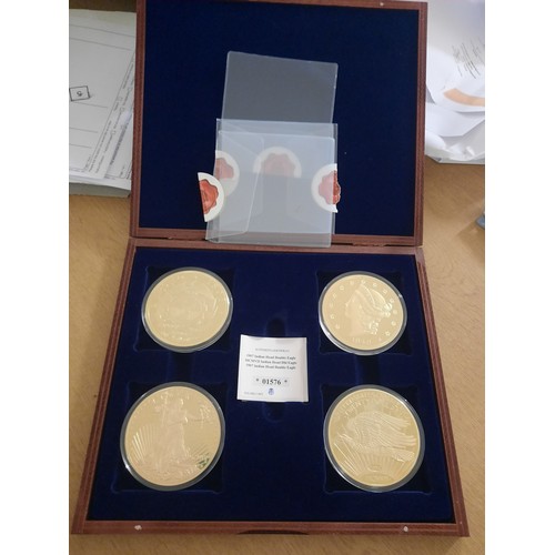 211 - 4 giant gold plated coins in wooden box