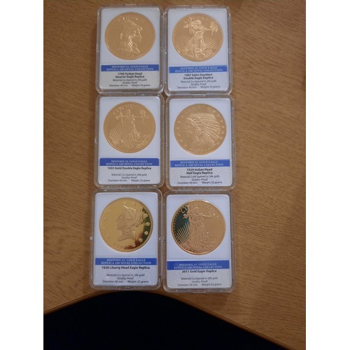 213 - American mint replica 24ct gold plated coin collection with 12 coins all in plastic casing with wood... 