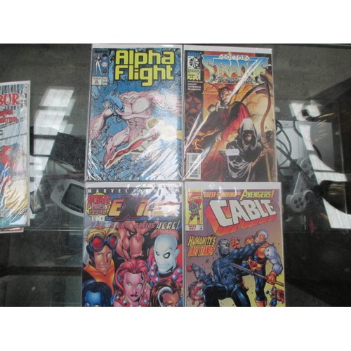 355 - 12 old marvels comics in protective packaging