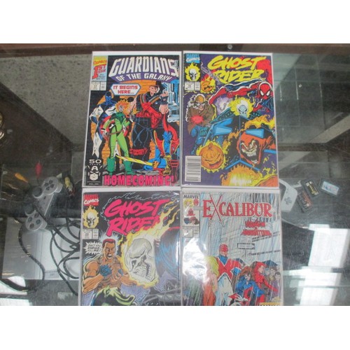 355 - 12 old marvels comics in protective packaging