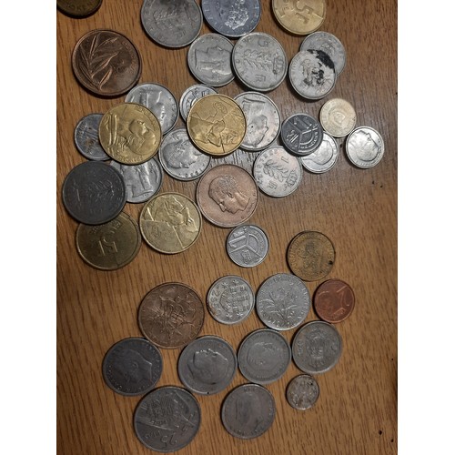 229 - Tub of various coins inc Kenya 5 shilling , Italian L.100 , Hong Kong 2 dollars etc