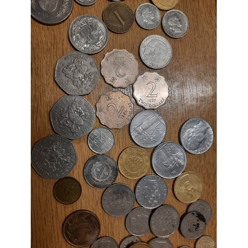 229 - Tub of various coins inc Kenya 5 shilling , Italian L.100 , Hong Kong 2 dollars etc