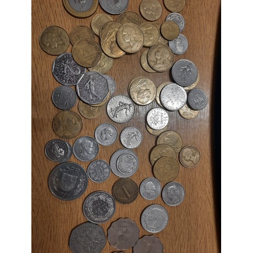 229 - Tub of various coins inc Kenya 5 shilling , Italian L.100 , Hong Kong 2 dollars etc