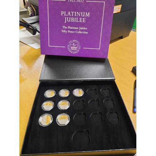 245 - Platinum jubilee 50p coin collection with 7 50p coins