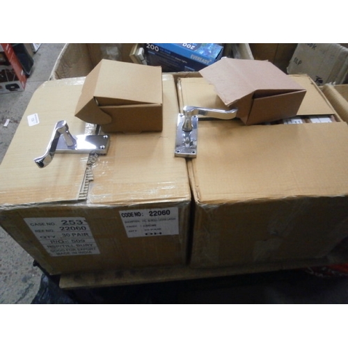 133 - Two boxes of new door handles