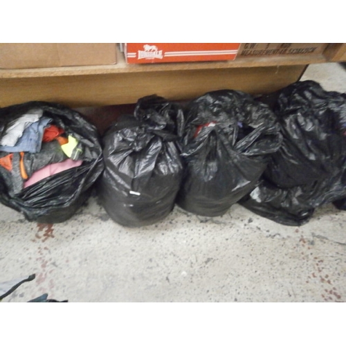 146 - Five bags of assorted clothes