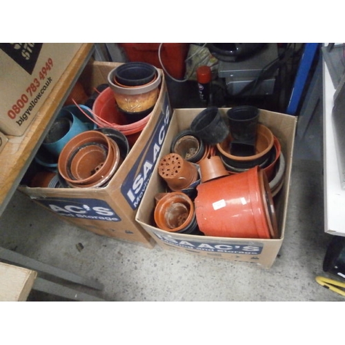 323 - Two boxes of plant pots