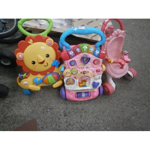 339 - Two activity boards and dolls pram