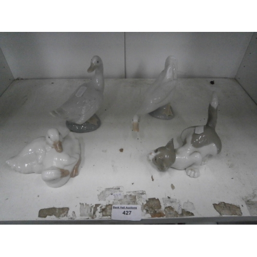 427 - Three Lladro goose figurines and cat figurine