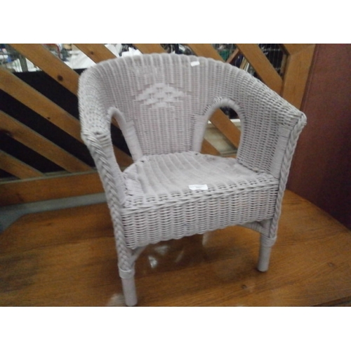 607 - Child's wicker tub chair