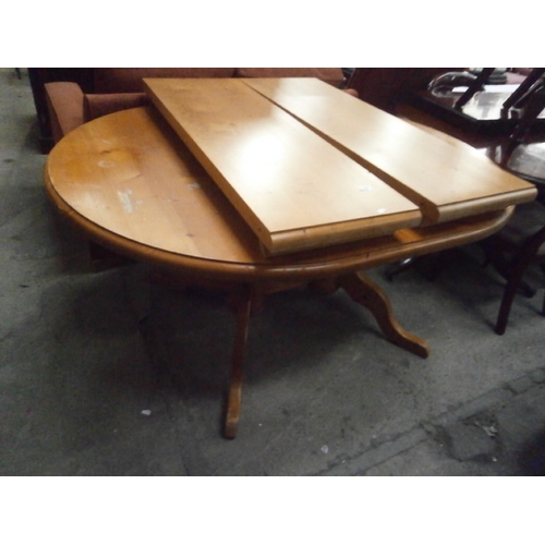 627 - Large twin pedestal extending pine dining table