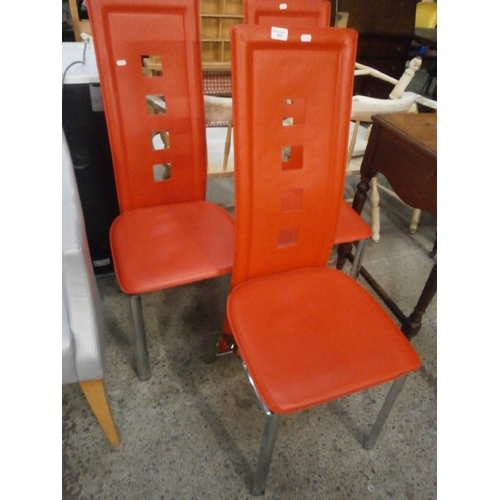 672 - 3 red faux leather dining chairs