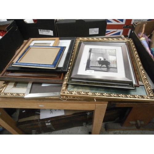 132 - Collection of assorted artwork and picture frames