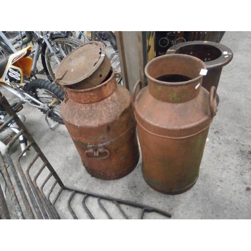 222 - Two vintage metal milk churns