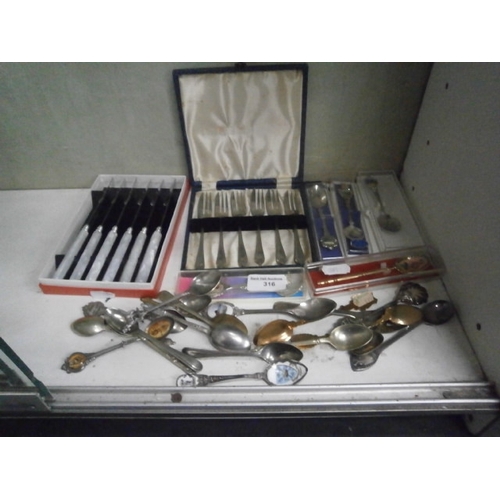 316 - Lot inc knife and fork sets and souvenir spoons