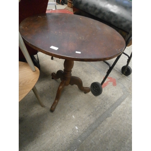 627 - Vintage circular tripod table on casters