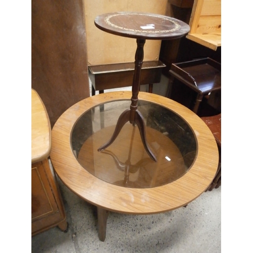 664 - A circular glass top coffee table and a small tripod stand