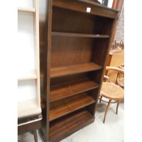 673 - An open mahogany bookcase