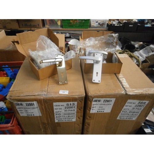 163 - Two boxes of new brass door handles