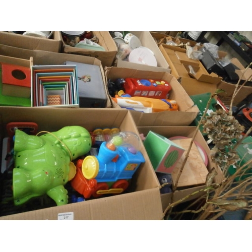 217 - Four boxes of assorted toys