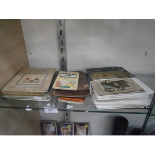 320 - Lot inc vintage books and old postcards