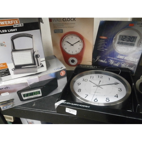 40 - Lot inc new wall clocks, radio alarm clock and LED light