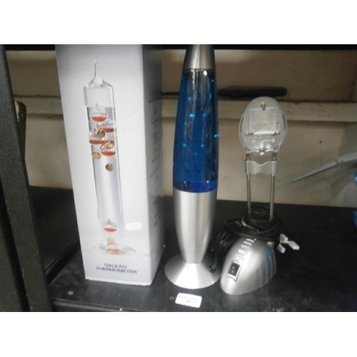 42 - Lot inc lava lamp, Galileo thermometer, lamp