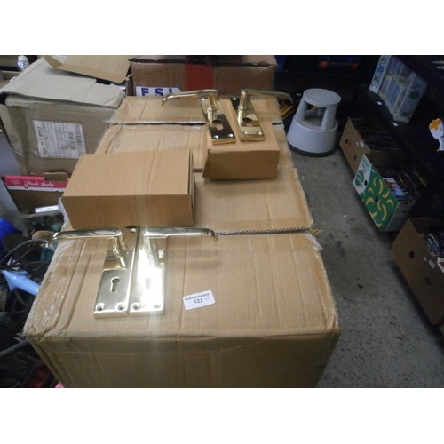 123 - Two boxes of new door handles