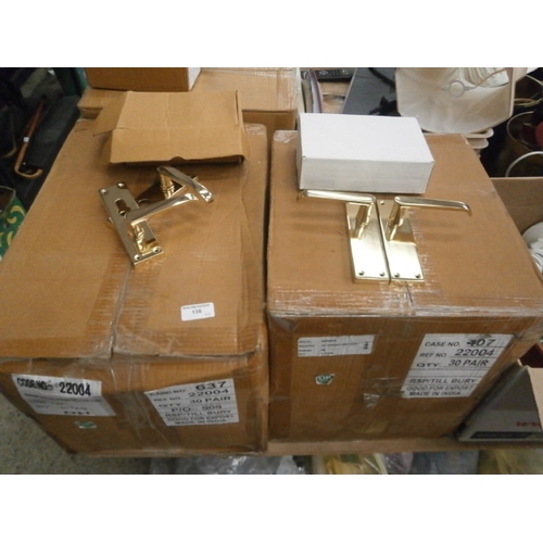 138 - Two boxes of new door handles