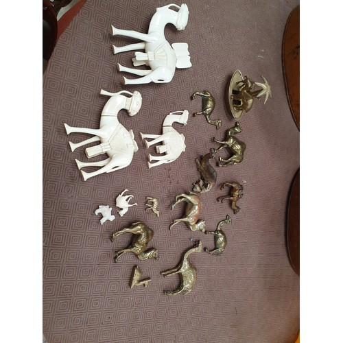 211 - Selection of camel ornaments inc brass