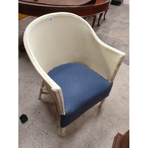 602 - Whicker tub chair