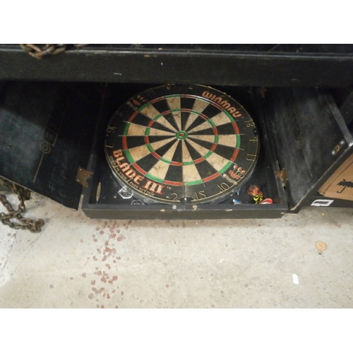 27 - Dartboard in case with darts