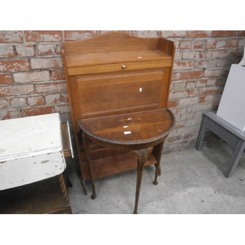 636 - A vintage student's bureau and a demi lune table