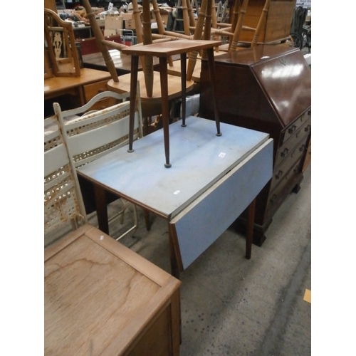 640 - A vintage drop leaf kitchen table and a small occasional table