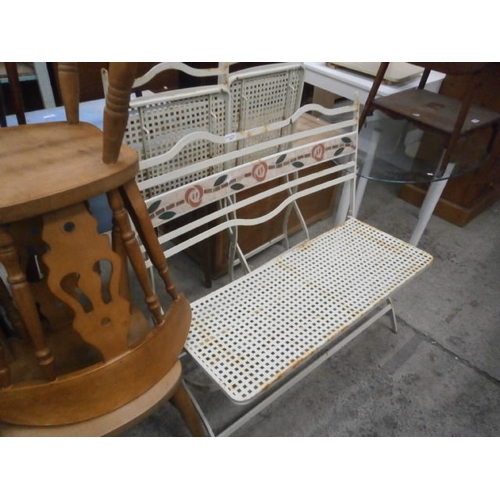 646 - A folding metal garden bench and chairs set