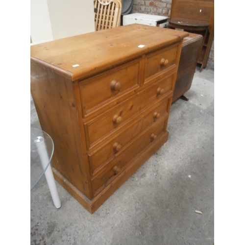 648 - A large pine 2 over 3 drawer chest