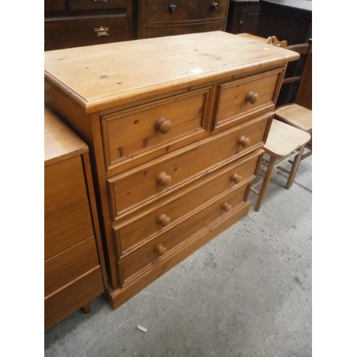 653 - A large pine 2 over 3 drawer chest