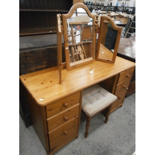 655 - A 6 drawer pine dressing table with triple mirror and stool