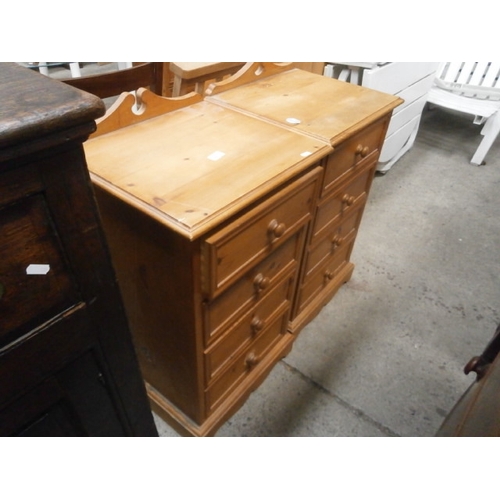 660 - A pair of pine 4 drawer bedside chests