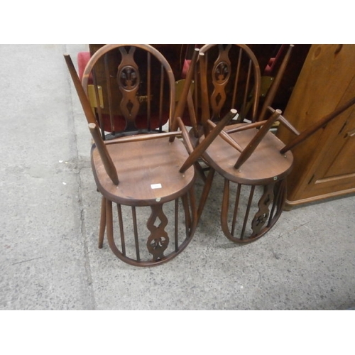 671 - A set of 4 x ERCOL Windsor Fleur de Lys dining chairs