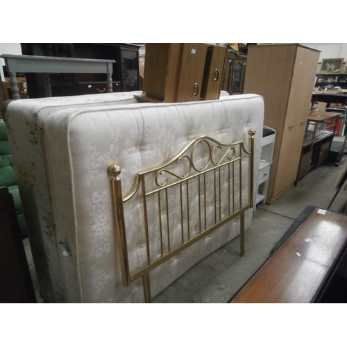 680 - A double divan bed with mattress, metal headboard and bedside stand