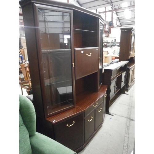 692 - A large glazed retro wall unit