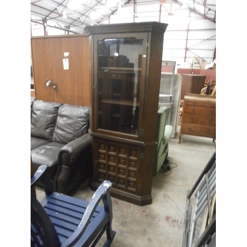 698 - A large glazed corner cabinet