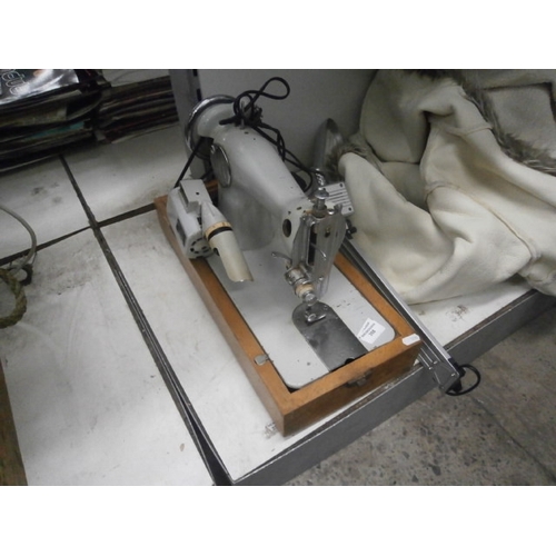 358 - Old Seamstress sewing machine and flexible light